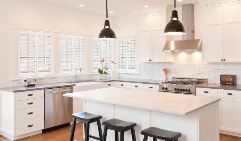 Plantation shutters in a bright Raleigh kitchen.